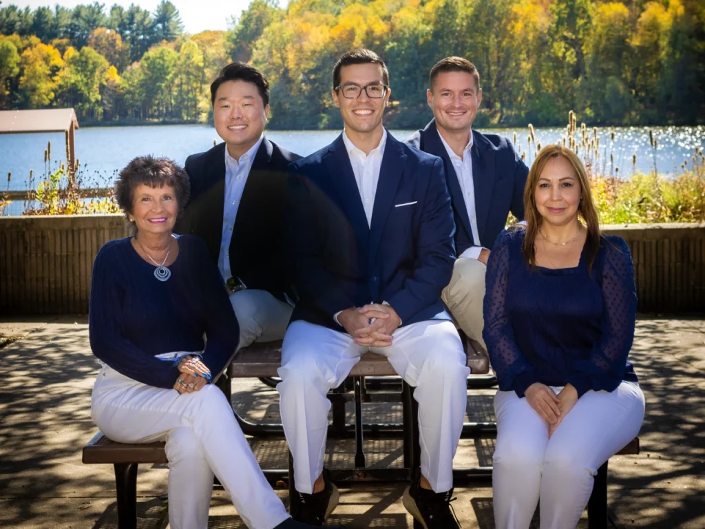 Dr. George Kwon and the Monroe Smiles team together outdoors